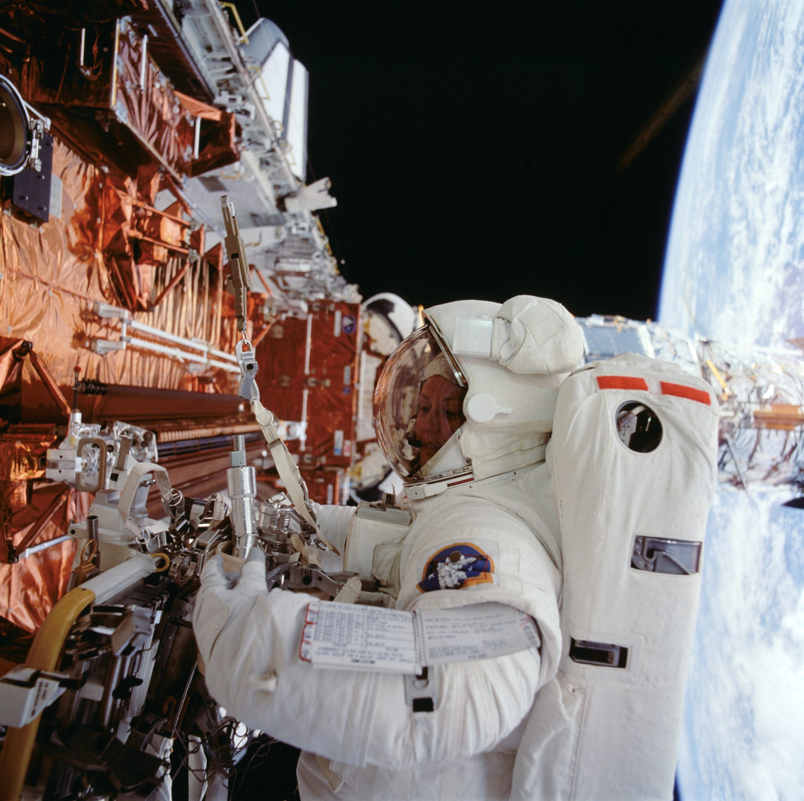 Astronaut Kathryn Thornton Works on Hubble Space Telescope