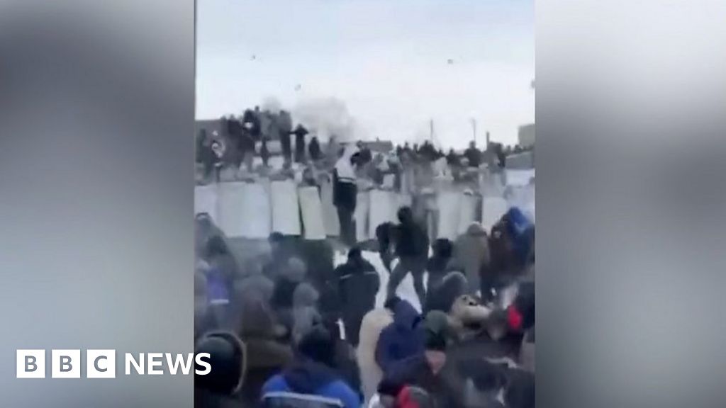Russia protest: Crowds throw snowballs at police as activist jailed